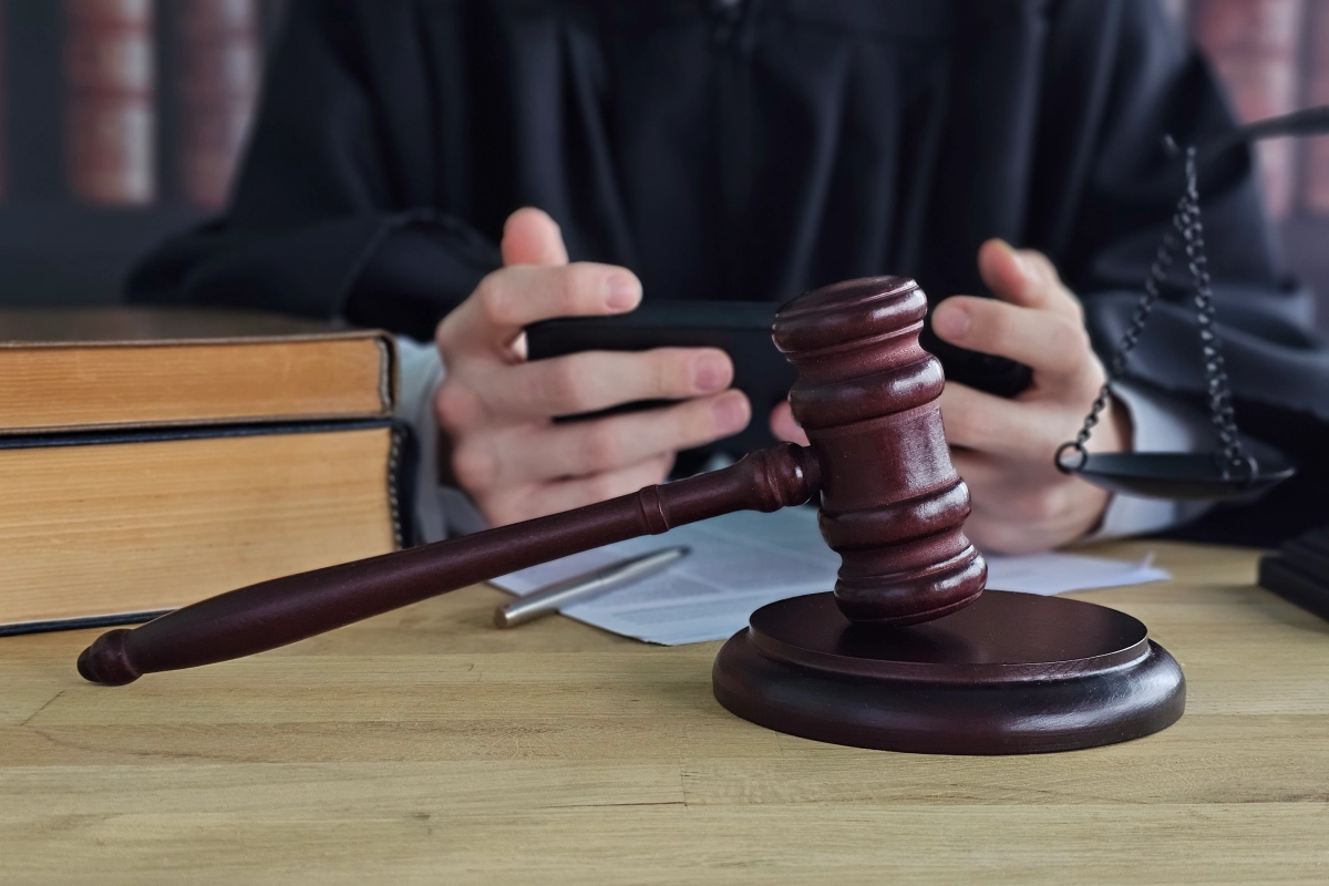 Legal documents and gavel in courtroom